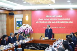 工作会议场景。图自越通社