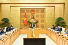 会议场景。图自越通社