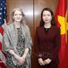 越南外交部副部长阮明姮与美国国务院政治事务副国务卿艾莉森·胡克。图自越通社