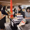 越南代表团的美食展位。图自越通社