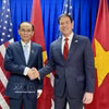 越共中央政治局委员、越南外交部长黎怀忠与美国国务卿马尔科·鲁比奥。图自越通社