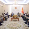  会见场景 图自越通社