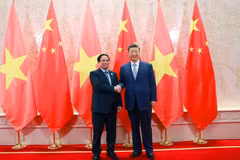 越南政府总理范明政会见中共中央总书记、国家主席习近平