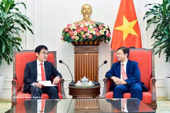 越南外交部副部长吴黎文会见东盟与东亚经济研究院（ERIA）院长渡边哲也。图自越通社
