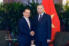 越共中央总书记、国家主席苏林会见新加坡国会议长谢健平。图自越通社