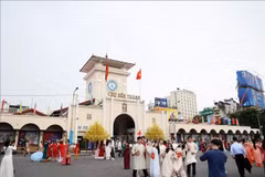 胡志明市滨城市场。图自越通社