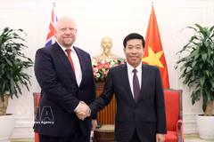 越南外交部副部长阮孟强与新西兰外交贸易部副部长格雷厄姆·莫顿。图自越通社