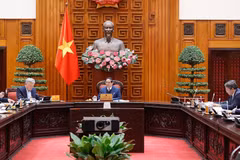 越南政府总理范明政主持召开国防部和公安部机构改革工作会议。图自越通社