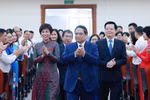 越南政府总理范明政和政府副总理梅文政一同出席越南共产党越通社机关第二十七次代表大会。图自越通社
