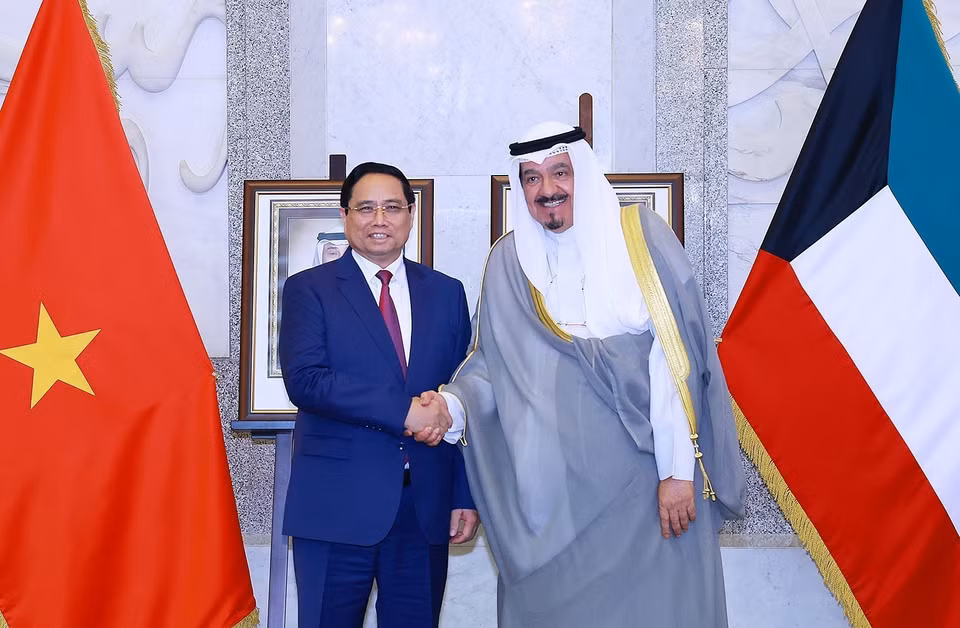 越南政府总理范明政与科威特国首相艾哈迈德·阿卜杜拉·艾哈迈德·萨巴赫举行会谈。图自越通社
