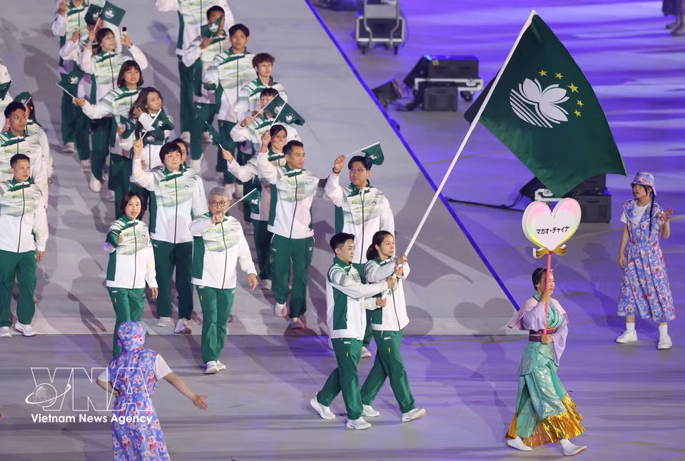 中国澳门体育代表团在第20届亚洲运动会（ASIAD 20）开幕式上入场。图自越通社