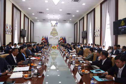 对话现场。图自越通社
