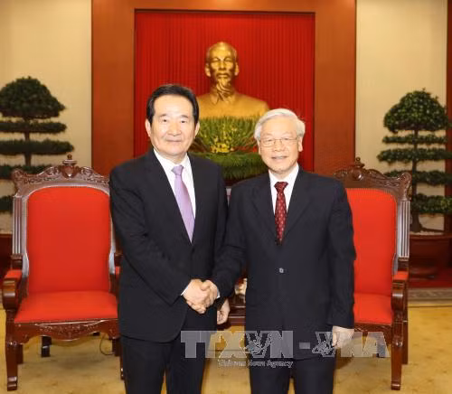 阮富仲总书记会见韩国国会议长丁世均 ảnh 1 阮富仲总书记会见韩国国会议长丁世均 ảnh 1