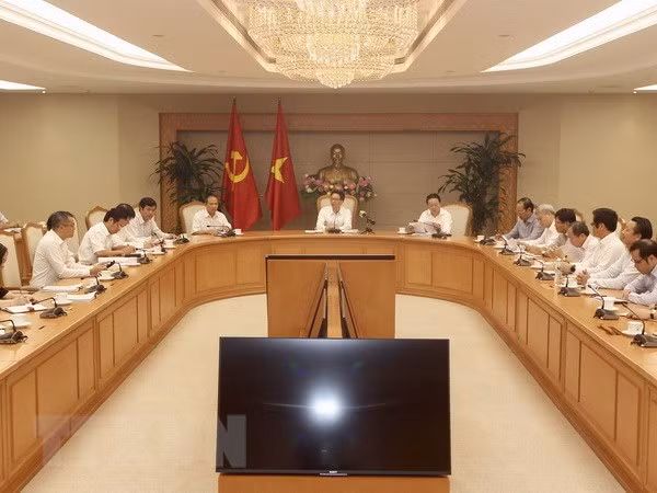 政府副总理武德儋：实现经济发展和环境保护并行已刻不容缓 ảnh 1