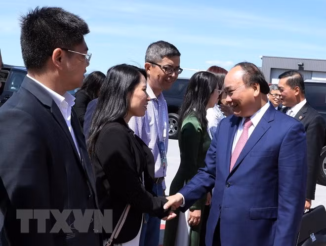 政府总理阮春福结束出席七国集团峰会扩大会议之旅 ảnh 1 政府总理阮春福结束出席七国集团峰会扩大会议之旅 ảnh 1