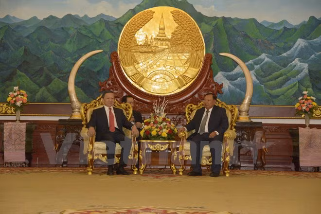 越南公安部高级代表团访问老挝 ảnh 1