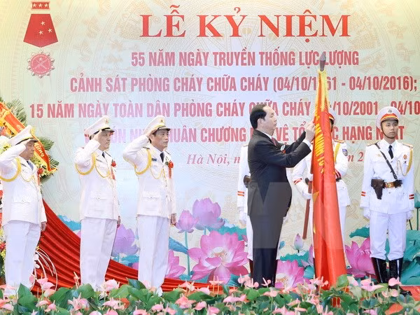 国家主席陈大光出席消防警察力量传统日55周年纪念典礼 ảnh 1