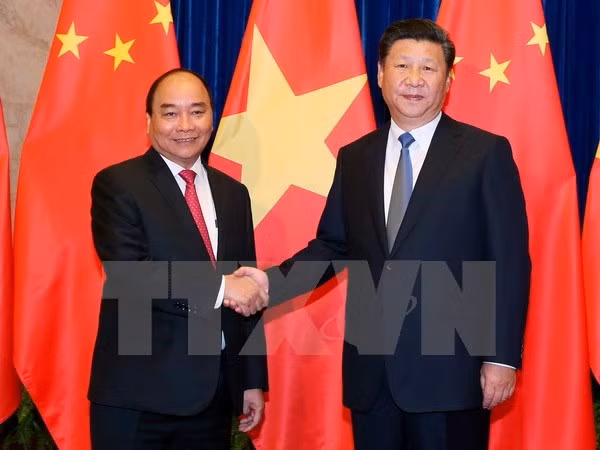 中国媒体密集报道越南政府总理阮春福访华之旅 ảnh 1 中国媒体密集报道越南政府总理阮春福访华之旅 ảnh 1