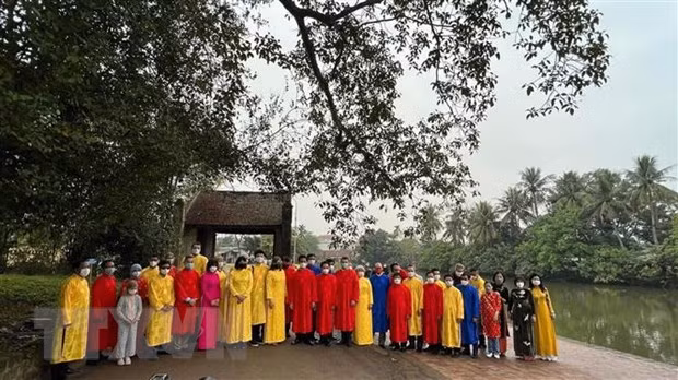 多国驻越大使和和国际组织代表体验传统春节活动在河内市举行 ảnh 2