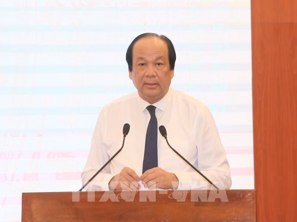 越南政府例行新闻发布会：越南迎来经济重启的黄金机会 ảnh 2