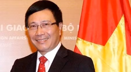 越南副总理兼外长范平明：东盟与越南的融合是一个互惠互利的过程 ảnh 1