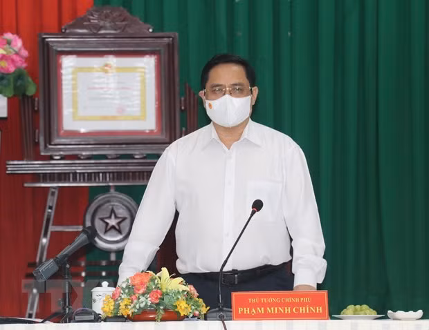 范明政总理：芹苴市医疗卫生系统应在地区疫情防控阻击战中发挥先锋模范作用 ảnh 1