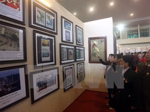 “黄沙、长沙归属越南：历史证据和法律依据”资料图片展在清化省举行 ảnh 1