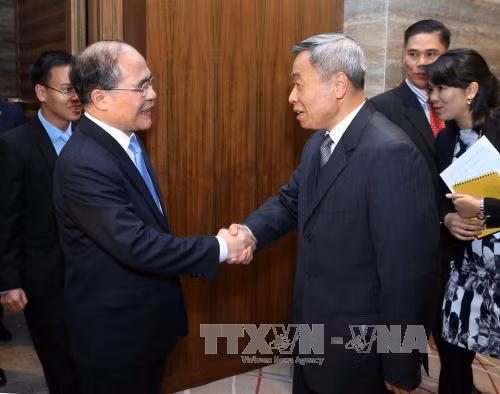 国会主席阮生雄会见中国广东省人大常委会主任黄龙云 ảnh 1