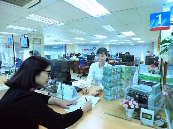 越南政府总理范明政同越南国家银行举行工作会议 ảnh 2 越南政府总理范明政同越南国家银行举行工作会议 ảnh 2