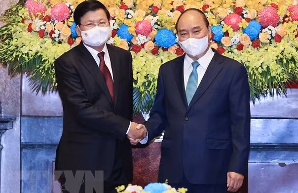 老挝领导访越之旅是两个民族的新历史里程碑 ảnh 1