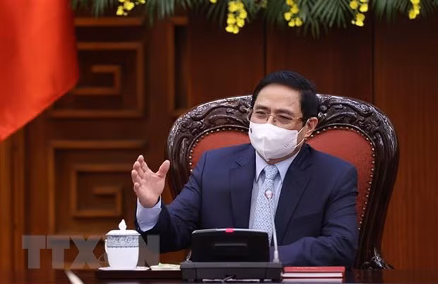 政府总理范明政:越南疫情防控工作取得积极成果 ảnh 1 政府总理范明政:越南疫情防控工作取得积极成果 ảnh 1