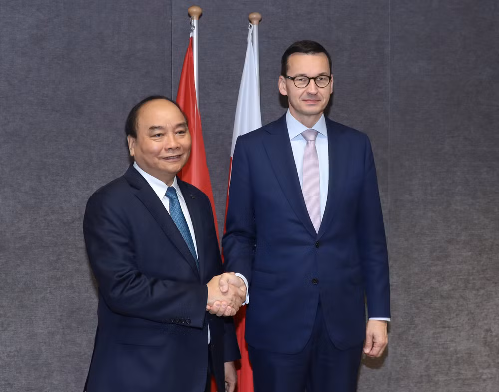 政府总理阮春福出席第十二届亚欧首脑会议期间举行多场双边会晤 ảnh 3 政府总理阮春福出席第十二届亚欧首脑会议期间举行多场双边会晤 ảnh 3