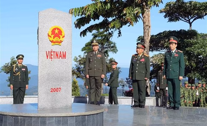 越南—老挝—柬埔寨举行首届边境国防友好交流活动 ảnh 1