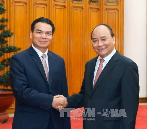 政府总理阮春福会见老挝客人 ảnh 1