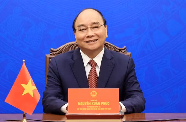 国家主席阮春福访问新加坡有助于推动两国关系迈上新台阶 ảnh 1
