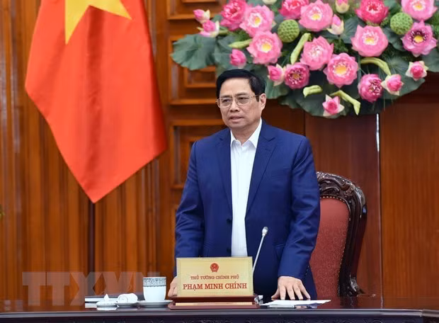 政府总理范明政就经济社会发展措施同岘港市领导举行座谈会 ảnh 1