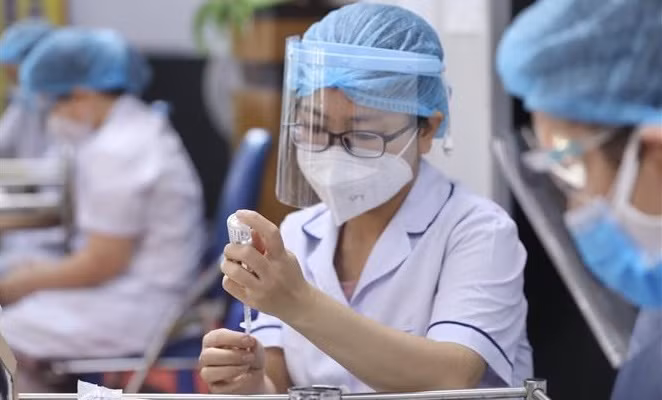 越南第十五届国会第二次会议:越南卫生部部长阮青龙:迅速扩大疫苗接种覆盖率 ảnh 2 越南第十五届国会第二次会议:越南卫生部部长阮青龙:迅速扩大疫苗接种覆盖率 ảnh 2