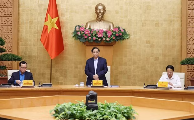 越南政府总理范明政主持政府与工会工作关系会议 ảnh 1 越南政府总理范明政主持政府与工会工作关系会议 ảnh 1