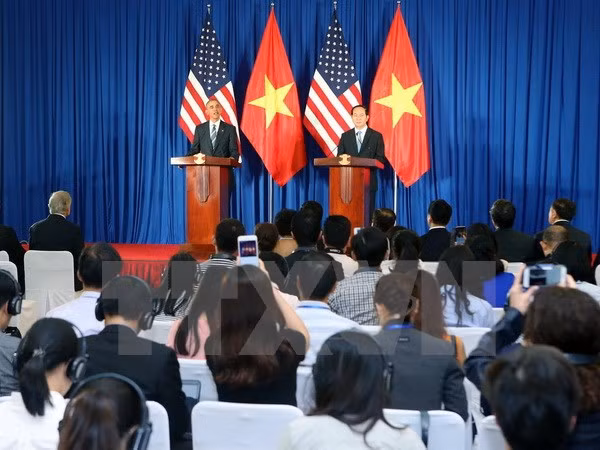 越南国家主席陈大光与美国总统奥巴马举行联合记者会 ảnh 1 越南国家主席陈大光与美国总统奥巴马举行联合记者会 ảnh 1