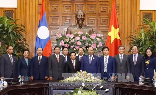 越南党和国家领导人分别会见老挝国家副主席潘坎•维帕万 ảnh 6 越南党和国家领导人分别会见老挝国家副主席潘坎•维帕万 ảnh 6