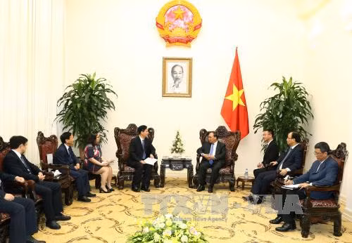  越南政府总理阮春福会见中国企业领导 ảnh 2