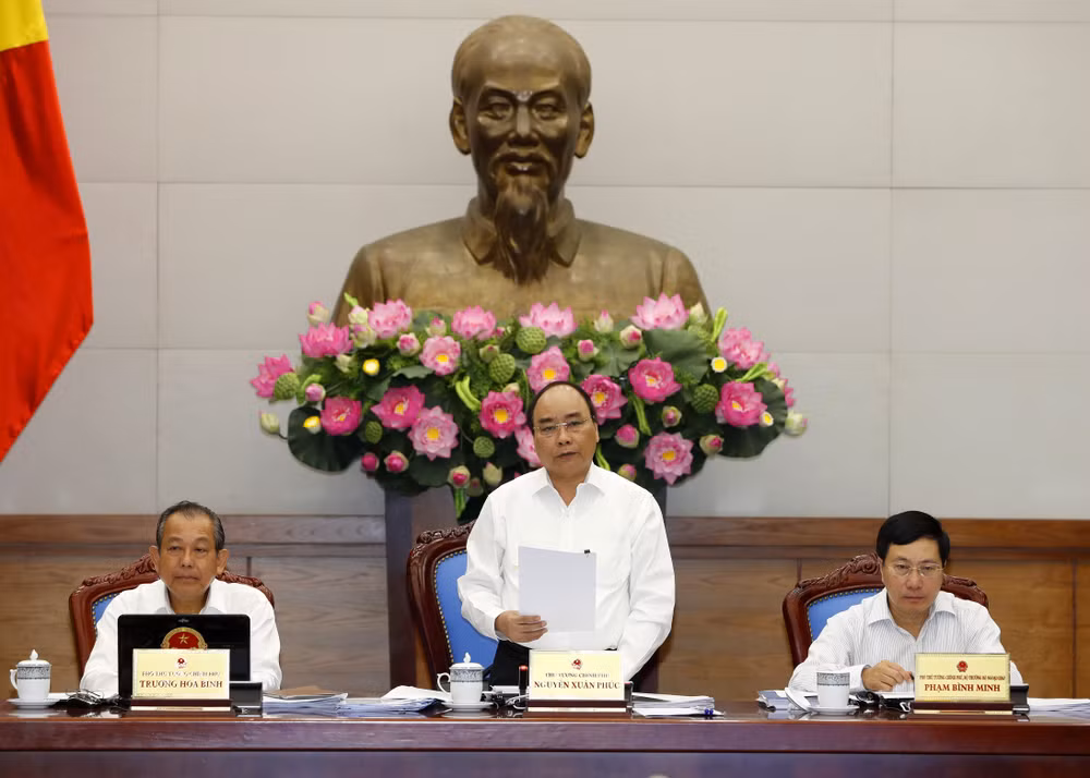 政府总理阮春福：坚定信心 努力完成2017年全年目标任务 ảnh 1