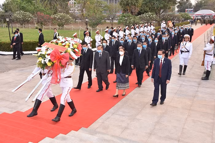 老挝各地纷纷举行老挝人民革命党建党65周年纪念活动 ảnh 1 老挝各地纷纷举行老挝人民革命党建党65周年纪念活动 ảnh 1