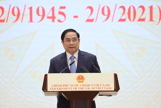 越南政府总理范明政出席2021年全球服务贸易峰会 ảnh 1