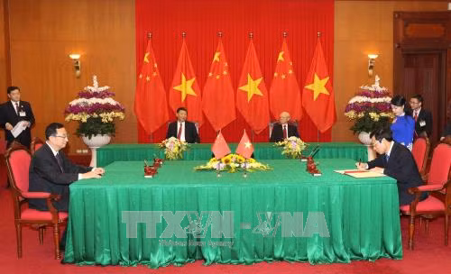 越共中央总书记阮富仲与中共中央总书记、国家主席习近平举行会谈 ảnh 3