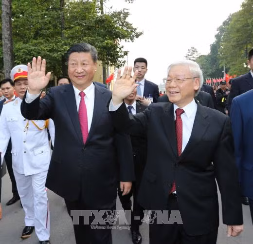 越共中央总书记阮富仲与中共中央总书记、国家主席习近平举行会谈 ảnh 2