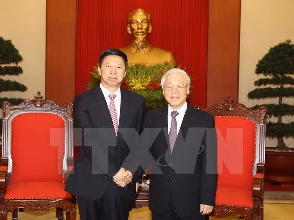  越共中央总书记阮富仲会见中共总书记特使 ảnh 1