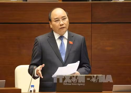 越南第十四届国会第二次会议:政府总理阮春福回复国会代表的提问 ảnh 1 越南第十四届国会第二次会议:政府总理阮春福回复国会代表的提问 ảnh 1