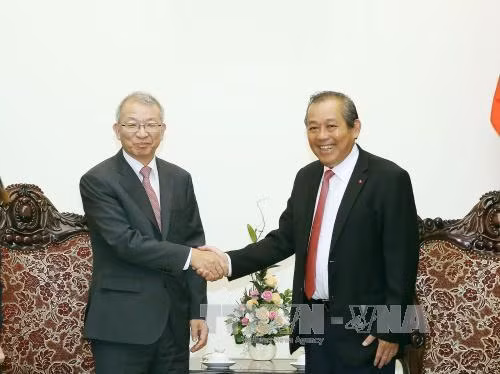 越南政府常务副总理张和平会见韩国大法院院长梁承泰 ảnh 1