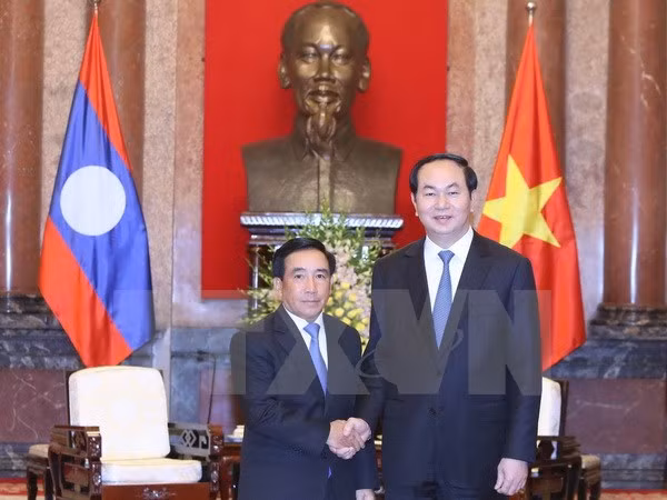 越南国家主席陈大光会见老挝客人 ảnh 1 越南国家主席陈大光会见老挝客人 ảnh 1